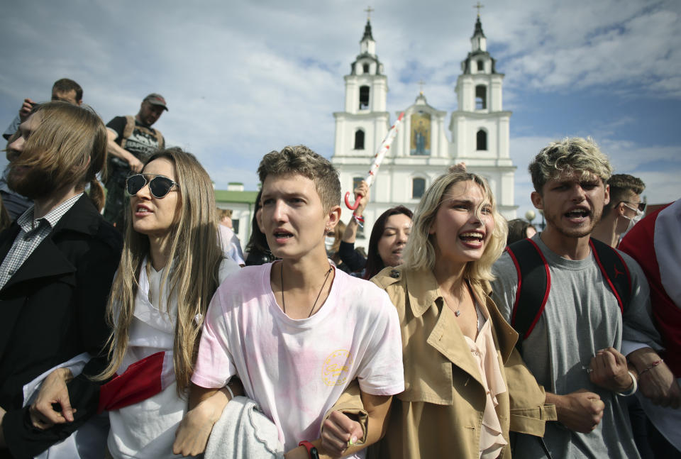 Belarus students attend a rally in Minsk, Belarus, Tuesday, Sept. 1, 2020. Several hundred students on Tuesday gathered in Minsk and marched through the city center, demanding the resignation of the country's authoritarian leader after an election the opposition denounced as rigged. Many have been detained as police moved to break up the crowds. (Tut.By via AP)