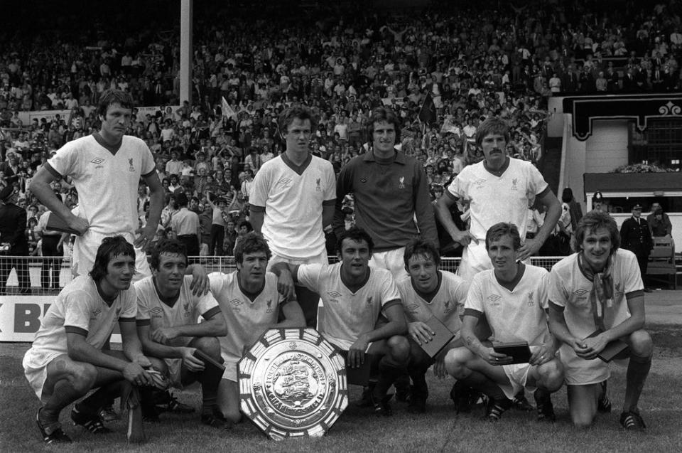 Ray Kennedy, fourth from left in the front row, celebrates winning the FA Charity Shield with Liverpool (PA) (PA Archive)