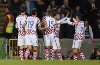 Britain Football Soccer - Northern Ireland v Croatia - International Friendly - Windsor Park, Belfast, Northern Ireland - 15/11/16 Croatia's Duje Cop celebrates scoring their second goal with Andrej Kramaric and teammates Reuters / Clodagh Kilcoyne Livepic