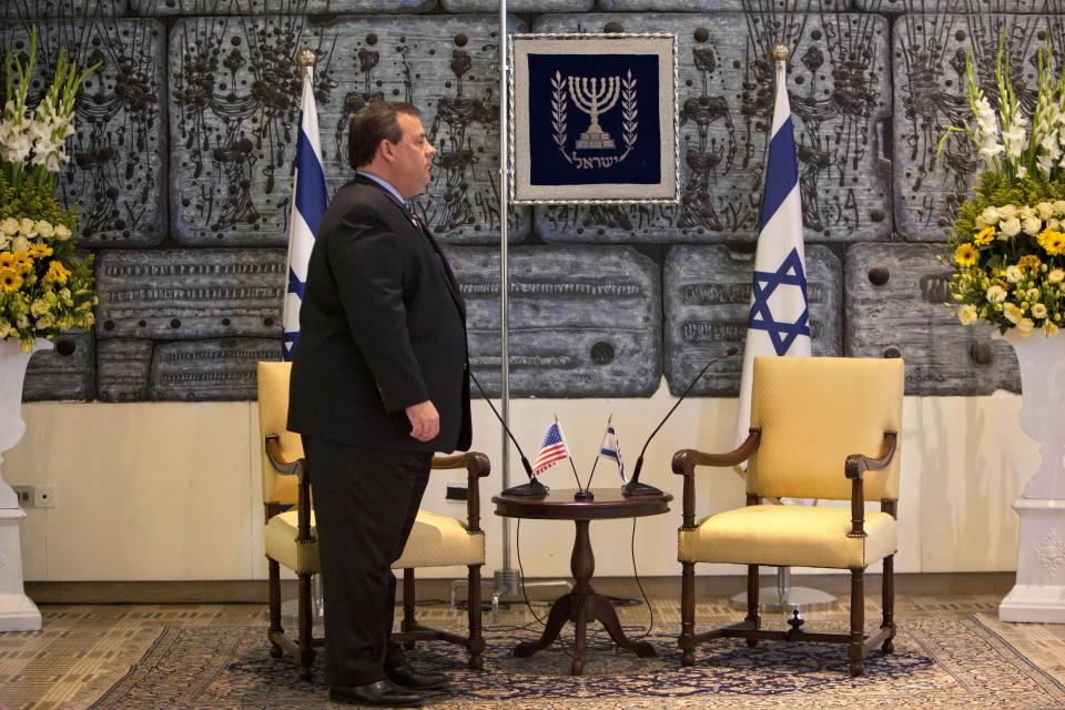 New Jersey Gov. Chris Christie waits for Israeli President Shimon Peres ahed of their meeting at the President's residence in Jerusalem, Tuesday, April. 3, 2012. Christie kicked off his first official overseas trip Monday meeting Israel's leader in a visit that may boost the rising Republican star's foreign policy credentials ahead of November's presidential election.(AP Photo/Oded Balilty)