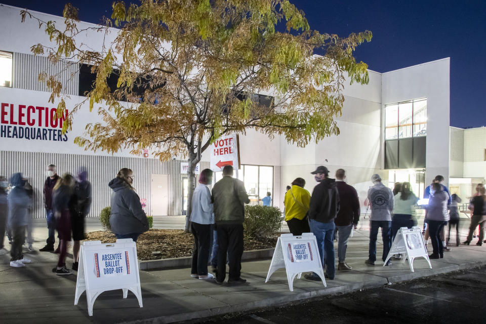 Image: Voters wait in a long line to vote in Boise, Idaho, on Nov. 3, 2020. (Darin Oswald / Idaho Statesman via AP file)