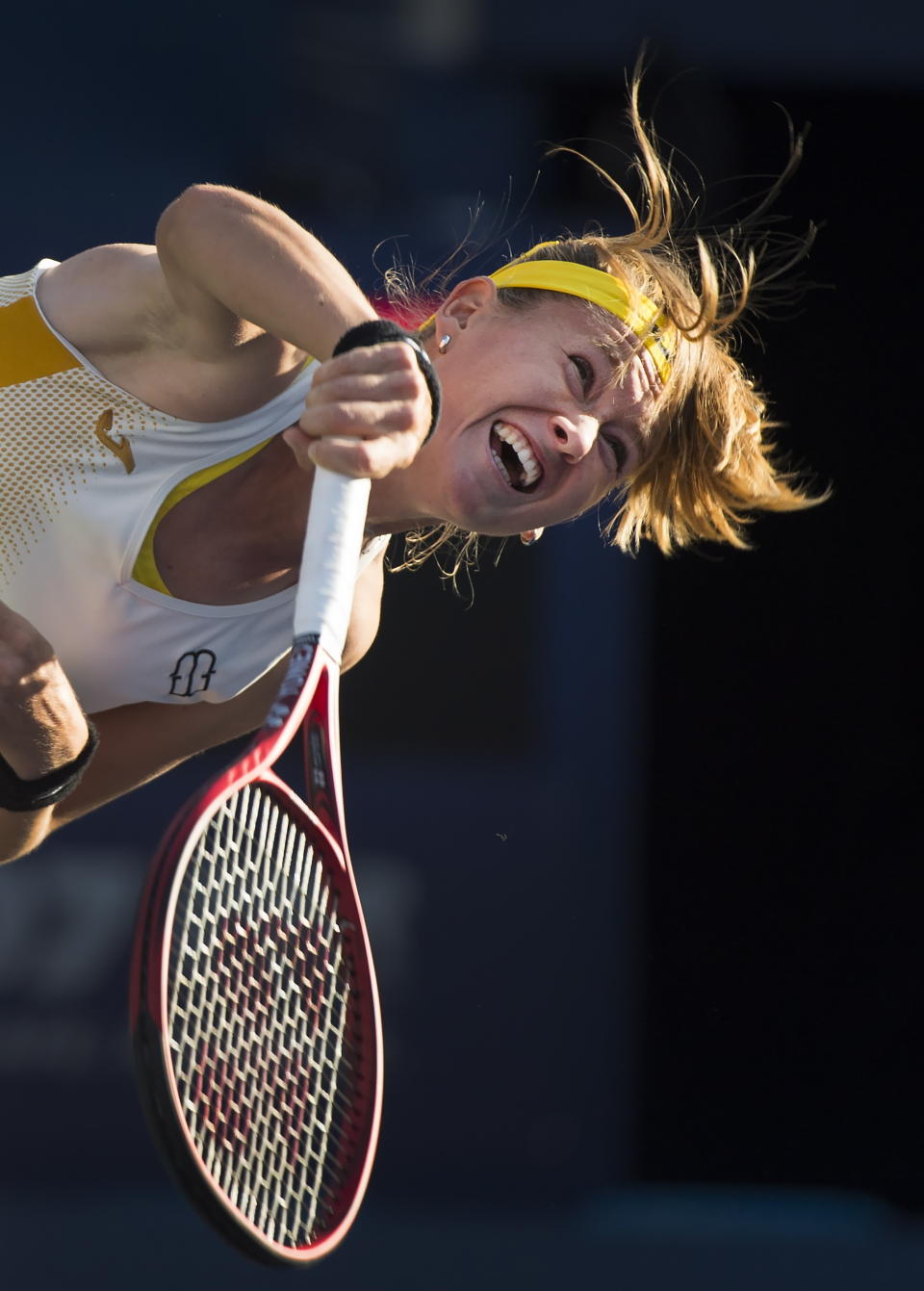 Marie Bouzkova, of the Czech Republic, serves against Serena Williams, of the United States, during semifinal Rogers Cup tennis tournament action in Toronto, Saturday, Aug. 10, 2019. (Nathan Denette/The Canadian Press via AP)