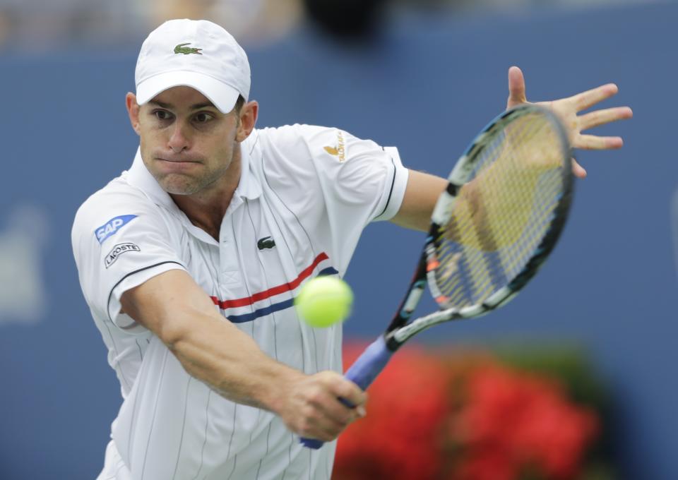 FILE - Andy Roddick returns a shot to Italy's Fabio Fognini in the third round of play at the 2012 US Open tennis tournament, Sept. 2, 2012, in New York. The latest in a series of attempts to help pickleball find a footing on television is coming Sunday, April 2, 2023, when Roddick, John McEnroe, Andre Agassi and Michael Chang take part in a made-for-TV exhibition in Hollywood, Florida. (AP Photo/Mike Groll, File)