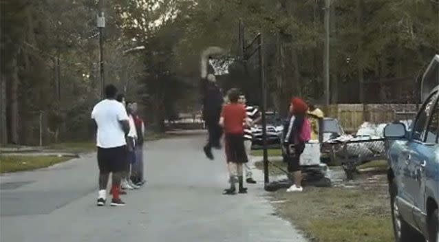 Officer White pulls off a sweet slam dunk. Picture: Facebook/Gainesville Police Department