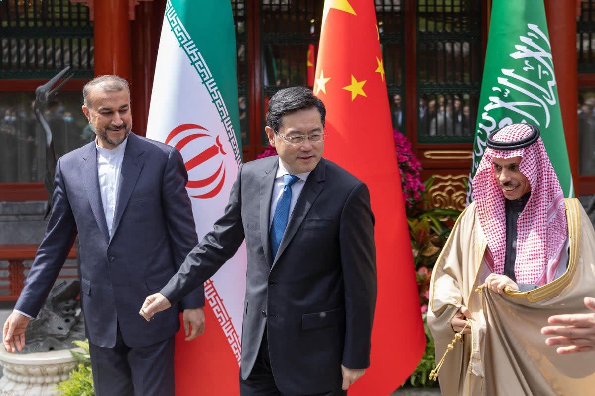 Iran’s foreign minister Hossein Amir-Abdollahian (L) walking alongside Saudi foreign afairs Minister Prince Faisal bin Farhan a-Saud (R) and Chinese foreign minister Qin Gang during a meeting in Beijing (SAUDI PRESS AGENCY/AFP via Getty)