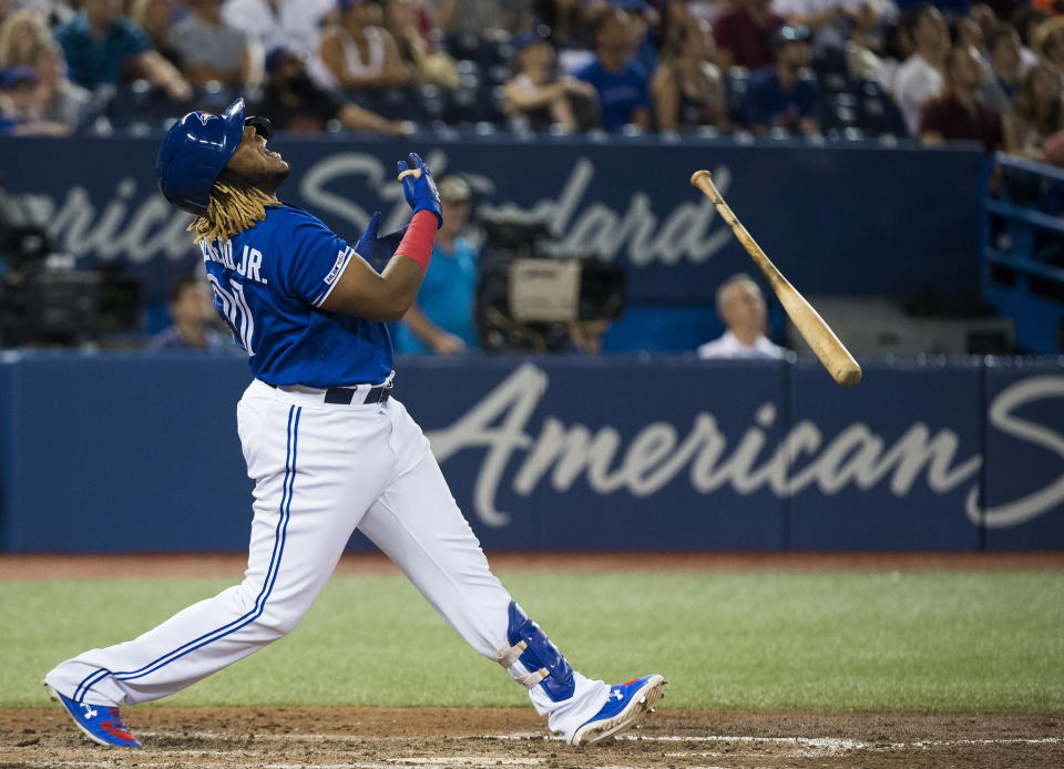 Toronto Blue Jays designated hitter Vladimir Guerrero Jr. reacts after hitting a pop flyout during ninth-inning baseball game action against the Tampa Bay Rays in Toronto, Sunday, July 28, 2019. (Nathan Denette/The Canadian Press via AP)