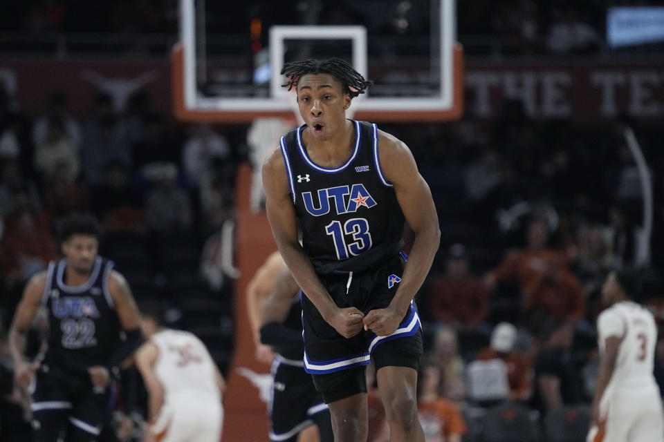 Texas-Arlington guard Kade Douglas (13) reacts to a score against Texas during the second half of an NCAA college basketball game in Austin, Texas, Monday, Jan. 1, 2024. (AP Photo/Eric Gay)