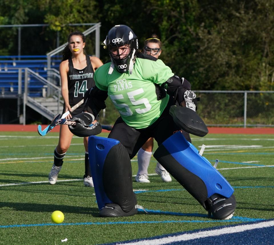 Panas goalie Kate Astrab (55) makes one of her 19 saves during field hockey action against Yorktown at Walter Panas High School in Cortlandt on Thursday, September 21, 2023. Astrab yielded one goal in a 1-0 loss.