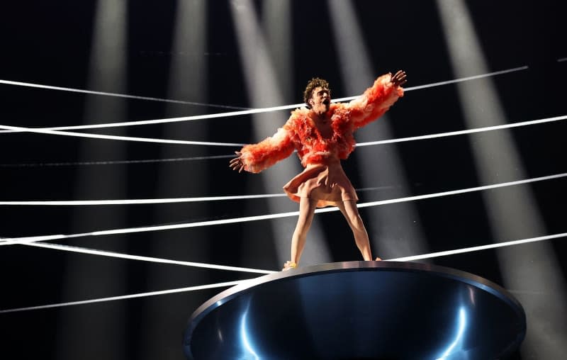 Nemo from Switzerland performs "The Code" on stage at the final of the Eurovision Song Contest (ESC) 2024 in the Malmö Arena. The motto of the world's biggest singing competition is "United By Music". Jens Büttner/dpa