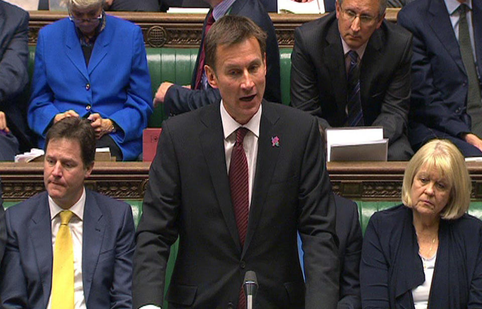 British Culture Secretary Jeremy Hunt speaks in the House of Commons, London, where he make a statement about his part in the News Corporation bid to take over BSkyB Wednesday April 25, 2012. Speculation that Rupert Murdoch was seeking to inflict political pain on the Cameron's Conservatives mounted Tuesday when his son James gave damning testimony about British Olympics czar Jeremy Hunt, releasing documents which suggested that the Conservative minister had secretly smoothed the way for News Corp.'s proposed takeover of British Sky Broadcasting Group PLC. (AP Photo/ PA Wire) UNITED KINGDOM OUT