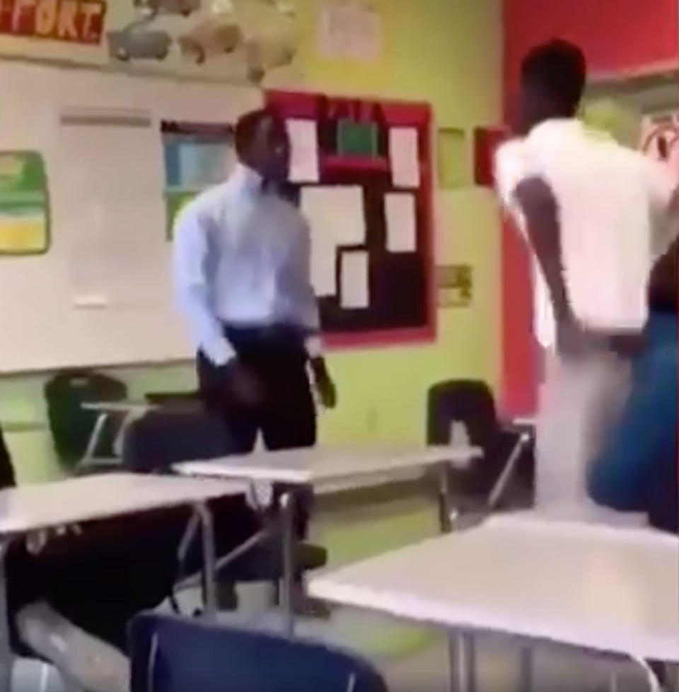 A teacher has been captured in shocking footage body-slamming a student in a classroom. Source: Perception Behind The Lens/ Facebook