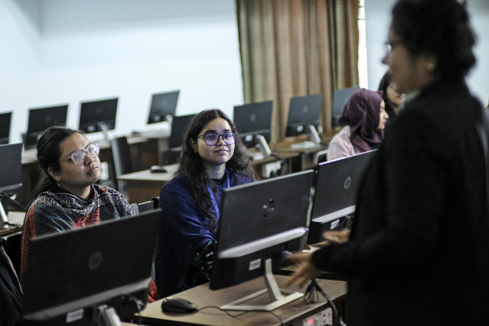 Achia Nila, founder of 'Women in Digital' technology center addresses a workshop at a university in Dhaka, Bangladesh, Dec. 26, 2023. Nila said many youngsters feel frustrated with corruption and bureaucracy and prefer to migrate to other countries because of “better opportunities”. Ahead of the Jan. 7 vote being boycotted by the main opposition, Prime Minister Sheikh Hasina is trying to woo the country’s first-time voters by carrying forward her government’s “Digital Bangladesh” project and promising a “smart Bangladesh” by 2041. (AP Photo/Mahmud Hossain Opu)