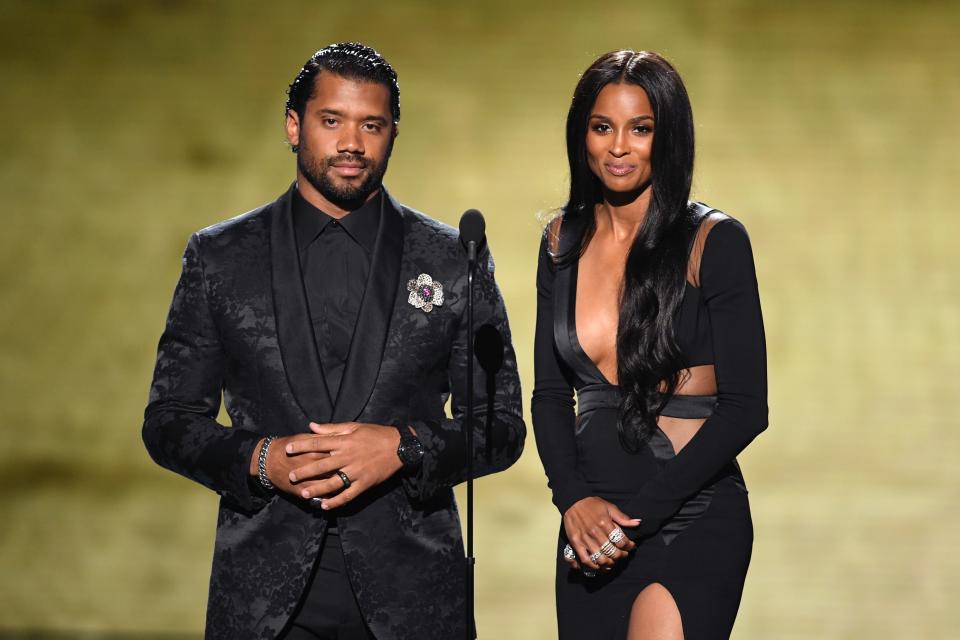 LOS ANGELES, CALIFORNIA - JULY 10: (L-R) Russell Wilson and Ciara speak onstage during The 2019 ESPYs at Microsoft Theater on July 10, 2019 in Los Angeles, California. (Photo by Kevin Winter/Getty Images)