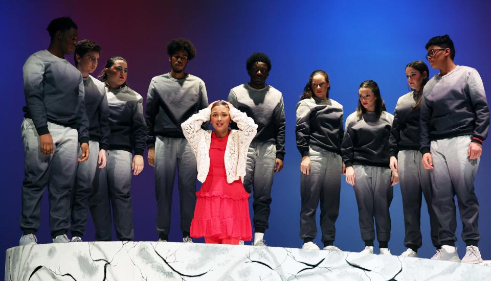 Yanisa Andrade as Gossip with the ensemble during the Brockton High School Drama Club's dress rehearsal of "Gossip" on Friday, March 17, 2023.