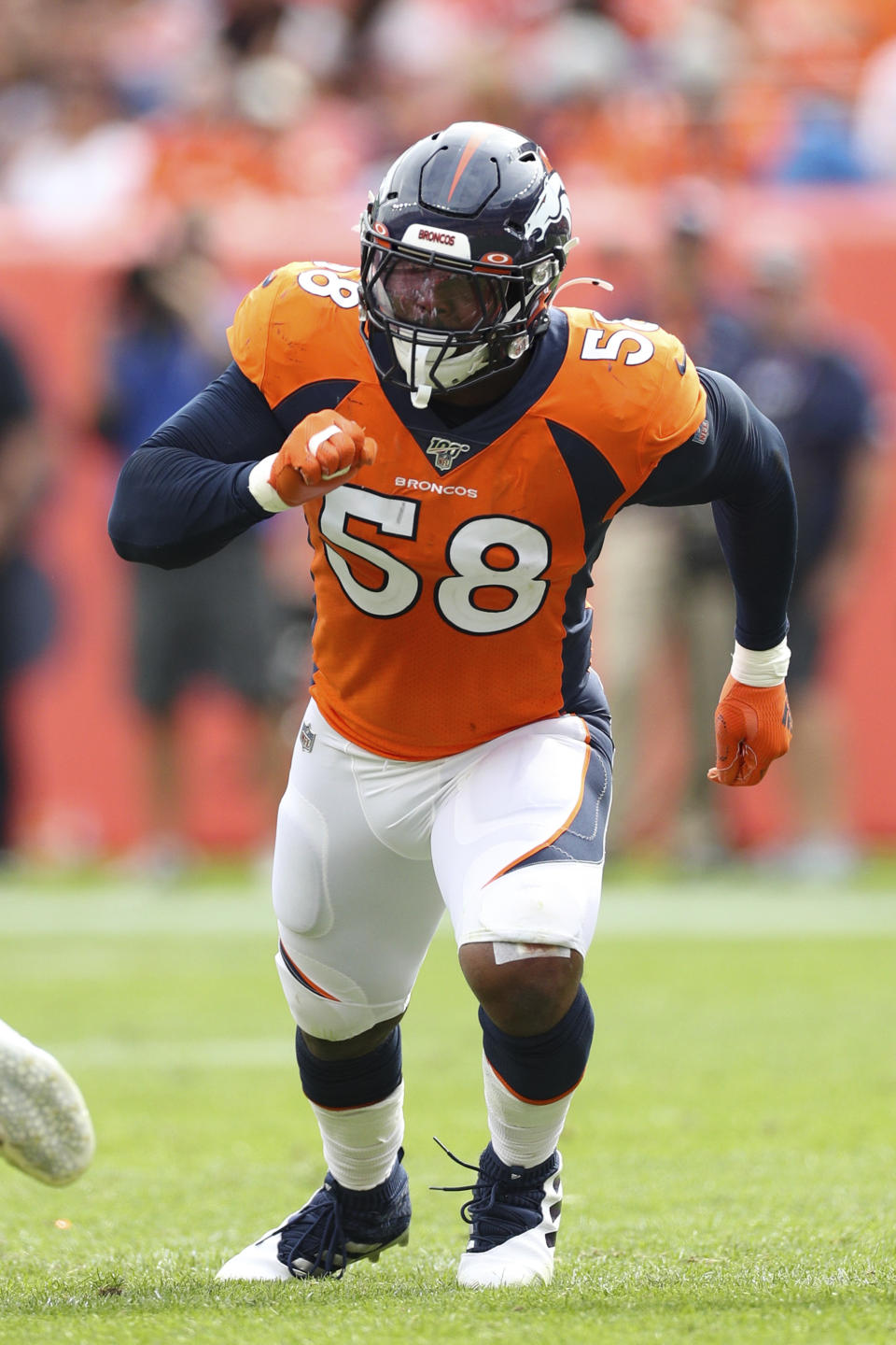 Denver Broncos outside linebacker Von Miller (58) takes a defensive position during an NFL game against the Chicago Bears, Sunday Sept. 15, 2019, in Denver. The Bears defeated the Broncos 16-14. (Margaret Bowles via AP)