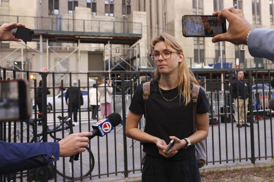 Kara McGee speaks to members of the media outside Manhattan criminal court, Tuesday, April 16, 2024, in New York. McGee, who works in cybersecurity, said she made eye contact with Trump after she told the judge that it would be hard for her to be a juror due to her work schedule. (AP Photo/Yuki Iwamura)