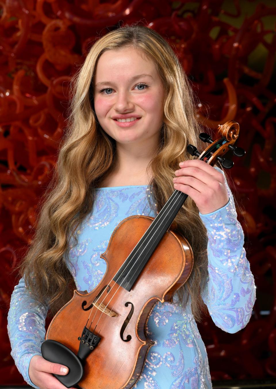 Whitney Baron, violinist, poses for photos for the 2023 Salute to Youth Portraits at Abravanel Hall in Salt Lake City on Wednesday, Oct. 4, 2023. | Scott G Winterton, Deseret News