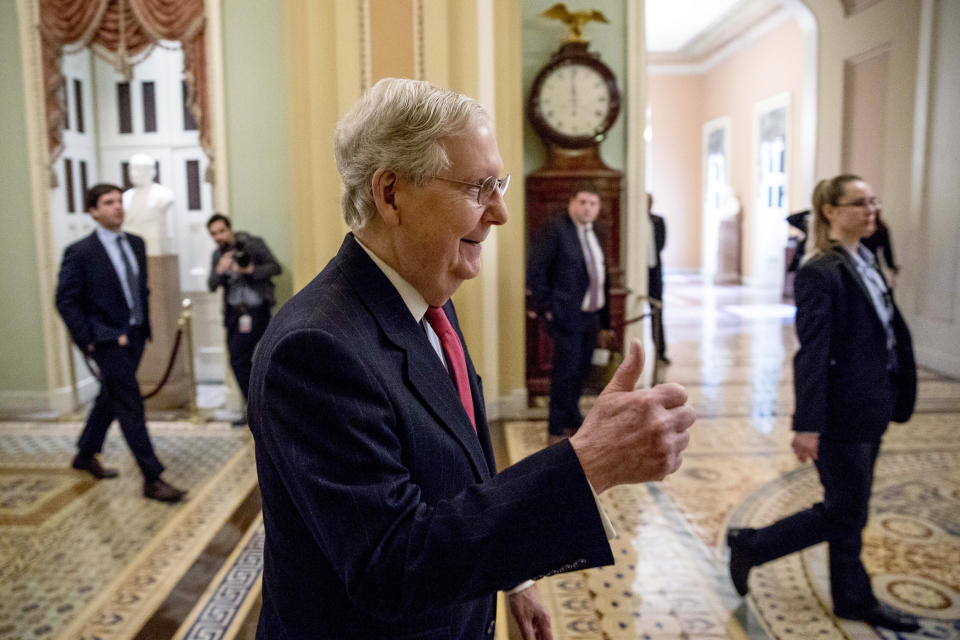 Senate Majority Leader Mitch McConnell of Ky. gives a thumbs up as he arrives on Capitol Hill, Wednesday, March 25, 2020, in Washington. (AP Photo/Andrew Harnik)