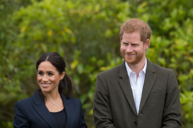 Britain's Prince Harry and Meghan, Duchess of Sussex, attend an event unveiling the Queen's Commonwealth Canopy in Redvale, North Shore, New Zealand