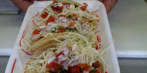 The best tacos in town are served at a food truck.