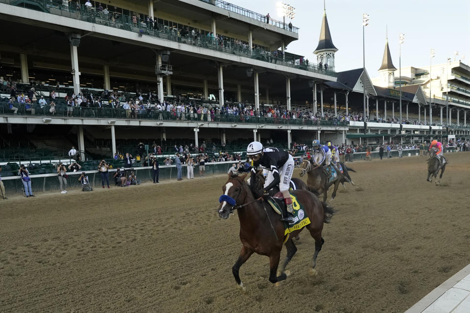 Jockey John Velazquez riding Authentic, wins the 146th running of the Kentucky Derby at Churchill Downs, Saturday, Sept. 5, 2020, in Louisville, Ky. (AP Photo/Jeff Roberson)