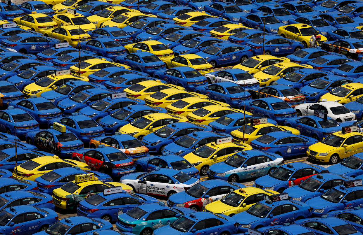 ComfortDelGro’s taxis at their vehicle inspection yard in Singapore. (Reuters file photo)