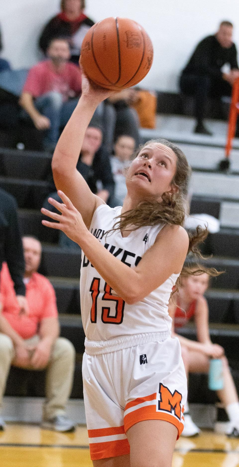 Marlington’s Ava Collins goes to the basket during a game against Minerva’s on Wednesday, Dec. 7, 2022.