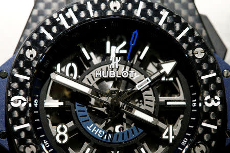 Hublot's logo is seen on a Big Bang Unico GMT Carbon watch at the Baselworld watch and jewellery fair in Basel, Switzerland March 23, 2017. REUTERS/Arnd Wiegmann