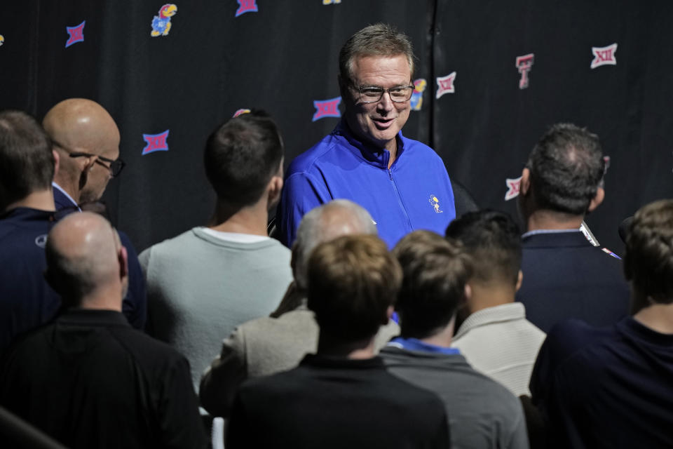 Kansas coach Bill Self speaks to the media during the NCAA college Big 12 men's basketball media day Wednesday, Oct. 18, 2023, in Kansas City, Mo. (AP Photo/Charlie Riedel)