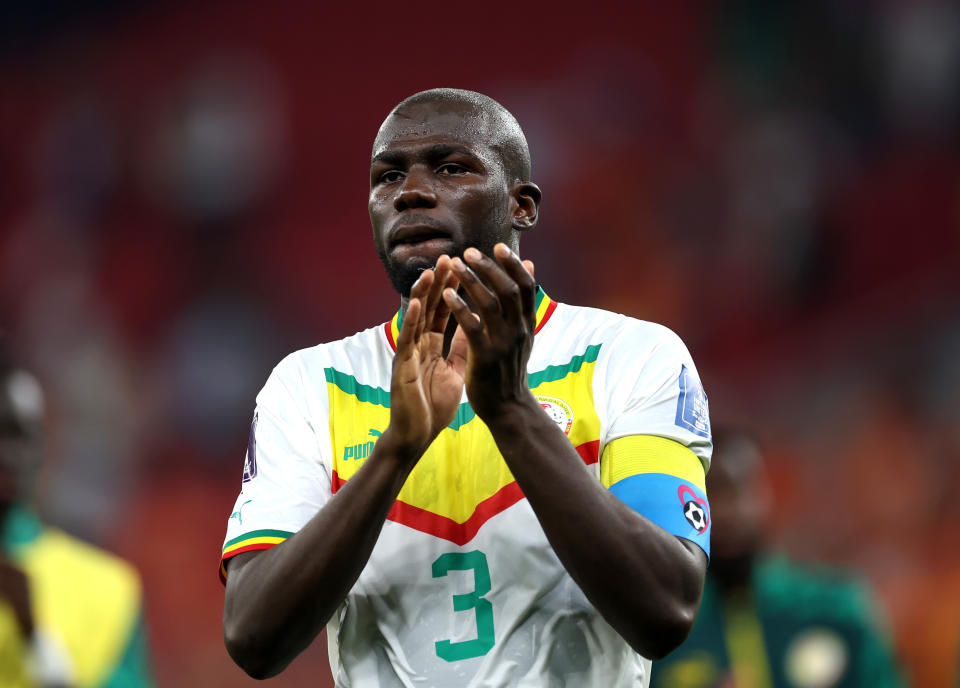 DOHA, QATAR - NOVEMBER 21: Kalidou Koulibaly of Senegal applauds the fans after their sides defeat during the FIFA World Cup Qatar 2022 Group A match between Senegal and Netherlands at Al Thumama Stadium on November 21, 2022 in Doha, Qatar. (Photo by Alex Grimm/Getty Images)