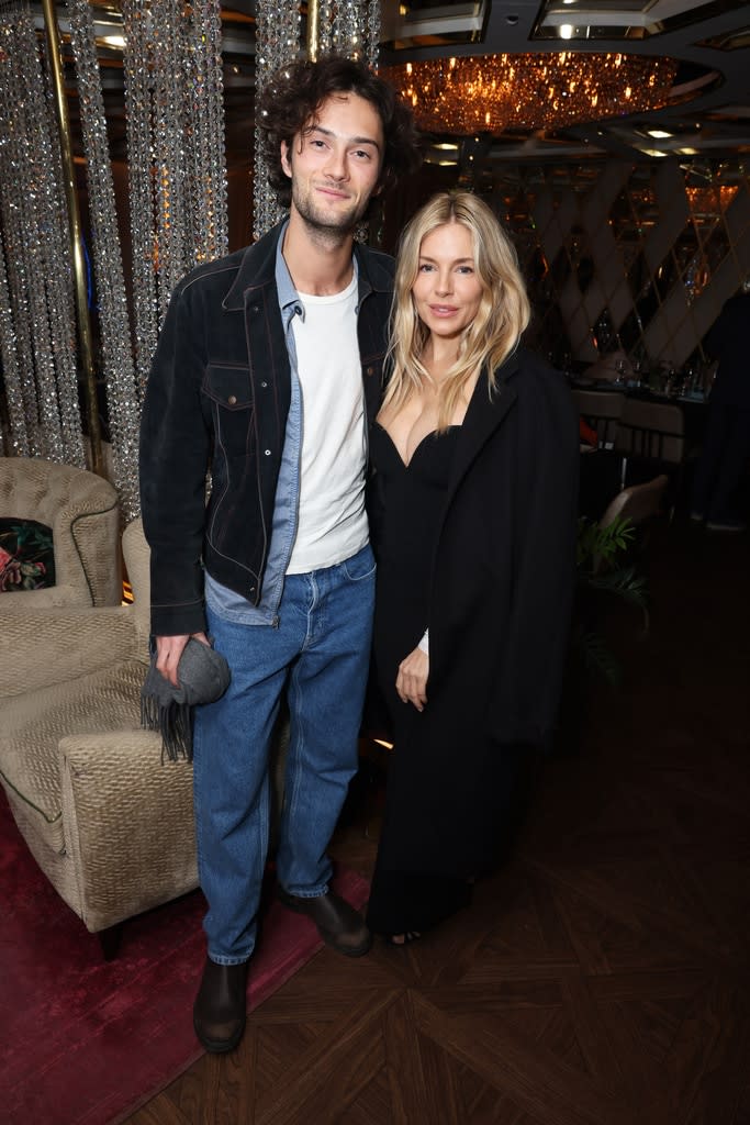 <p>Oli Green & Sienna Miller</p>