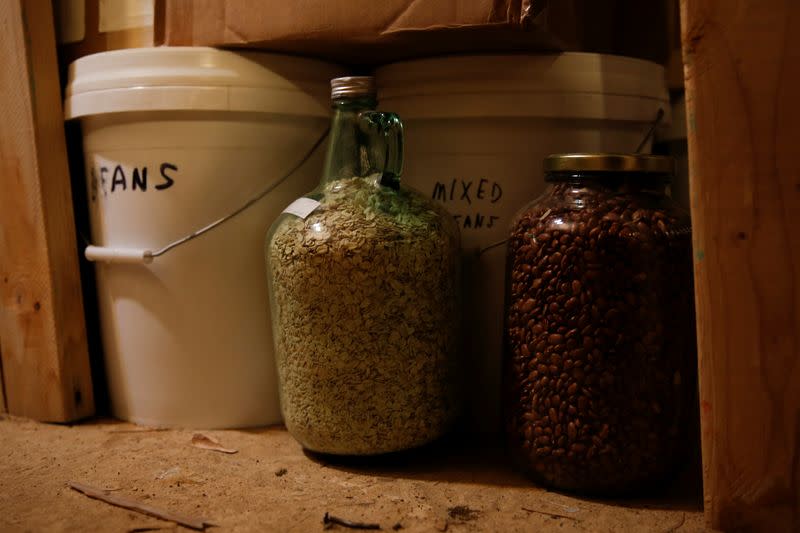 Emergency food is stocked in an underground bunker at a survival camp