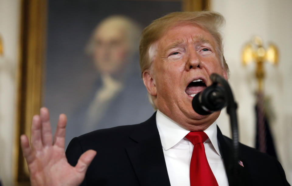 President Donald Trump speaks about the partial government shutdown, immigration and border security in the Diplomatic Reception Room of the White House, in Washington, Saturday, Jan. 19, 2019. (AP Photo/Alex Brandon)