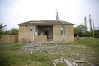 A view shows a house that was allegedly damaged by recent shelling during the fighting over the breakaway region of Nagorno-Karabakh in Terter