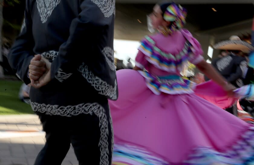 LOS ANGELES, CA - MAY 05:. Ballet Folklorico dancers join Cinco de Mayo festivities in Long Beach on Wednesday, May 5, 2021. The day commemorates the Mexican people's victory over French forces at the Battle of Puebla on May 5, 1862. T (Luis Sinco / Los Angeles Times)