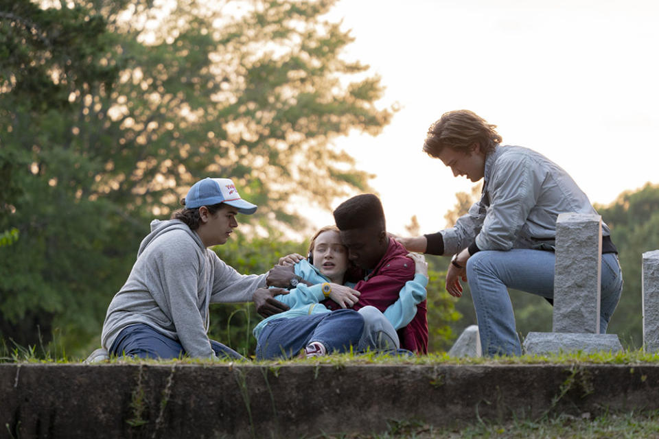 Dustin (Gaten Matarazzo) with Max and Lucas, and Steve (Joe Keery). - Credit: Tina Rowden/Netflix