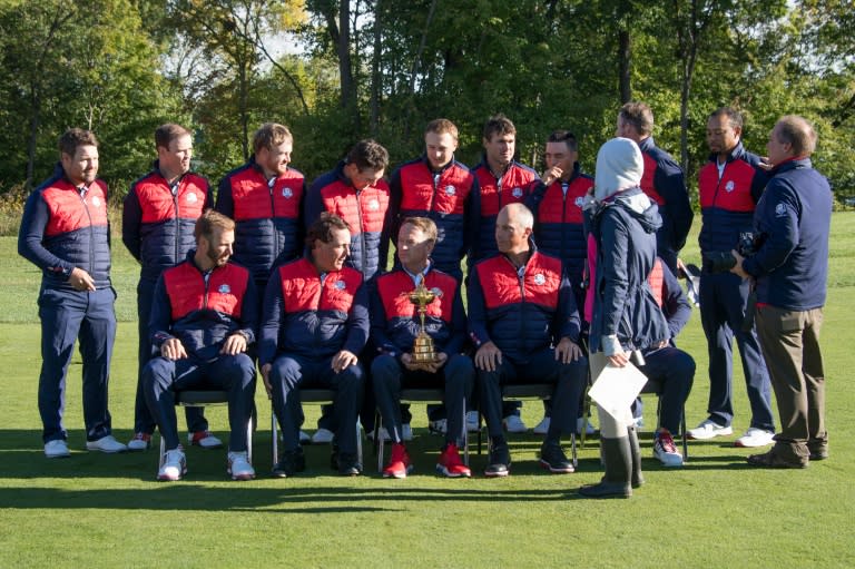 The USA team poses for pictures at Hazeltine National Golf Course in Chaska, Minnesota, September 27, 2016, ahead of the 41st Ryder Cup