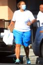 <p>Queen Latifah stops to pick up takeout at a taco restaurant in West Hollywood on Wednesday, casually dressed in a white tee and blue shorts.</p>