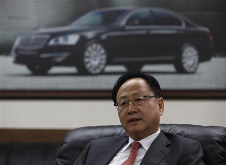 Lee Yoo-il, President and CEO of Ssangyong Motor Co, speaks during an interview with Reuters at his office in Seoul December 10, 2013. REUTERS/Kim Hong-Ji