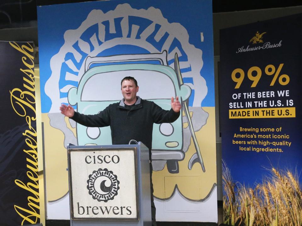 Nick Murray, general manager of the brewery at Cisco Brewers Portsmouth, welcomes people to an event celebrating a new canning line at the Pease facility Friday, Feb. 17, 2023.