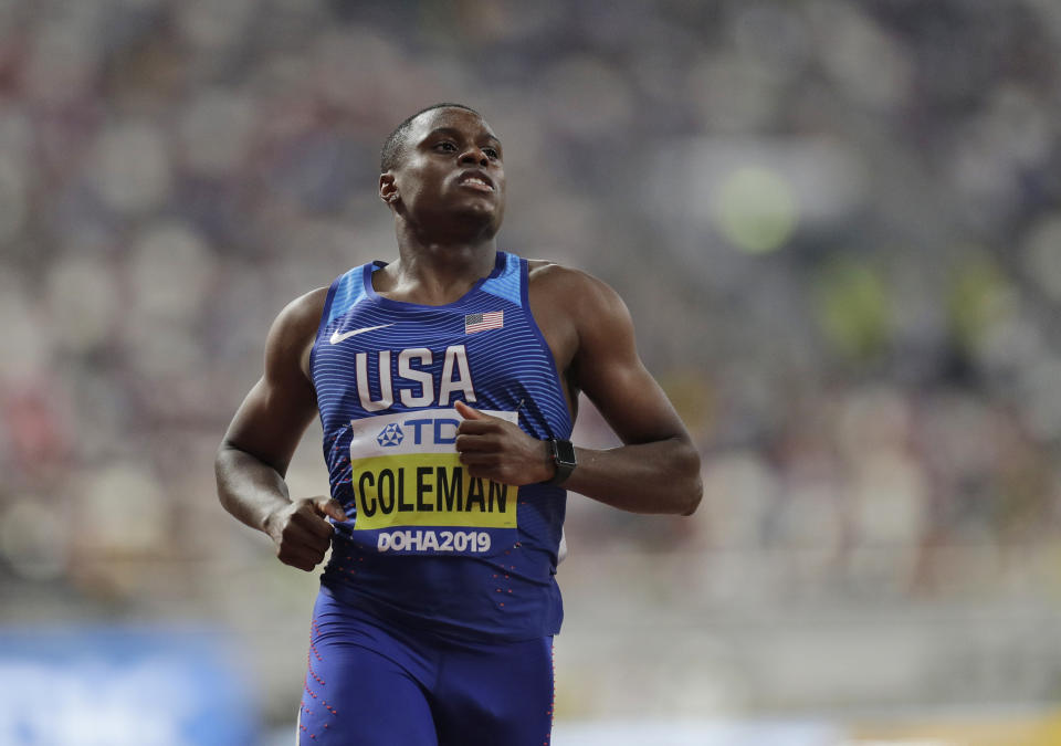 Christian Coleman of the United States competes during the men' 100 meters heats at the World Athletics Championships in Doha, Qatar, Friday, Sept. 27, 2019. (AP Photo/Petr David Josek)