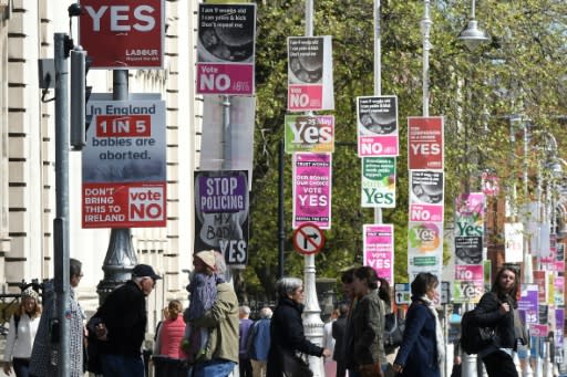 Opinion is sharply divided as reflected in competing 'Yes' and 'No' posters ahead of Ireland's abortion referendum on Friday