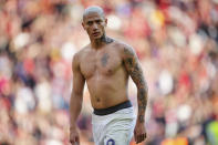 Tottenham's Richarlison leaves the pitch at the end of the English Premier League soccer match between Liverpool and Tottenham Hotspur at Anfield Stadium in Liverpool, England, Sunday, May 5, 2024. (AP Photo/Jon Super)