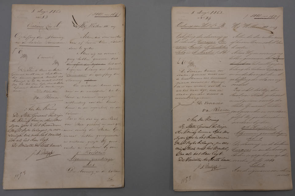 Legislation signed on Aug. 8, 1862, abolishing slavery on July 1, 1863, is shown at the National Archives in The Hague, Netherlands, Monday, Dec. 19, 2022. The Dutch government is expected to issue a long-awaited formal apology for its role in the slave trade, with a speech by Dutch Prime Minister Mark Rutte, and ceremonies in the former colonies. (AP Photo/Peter Dejong)