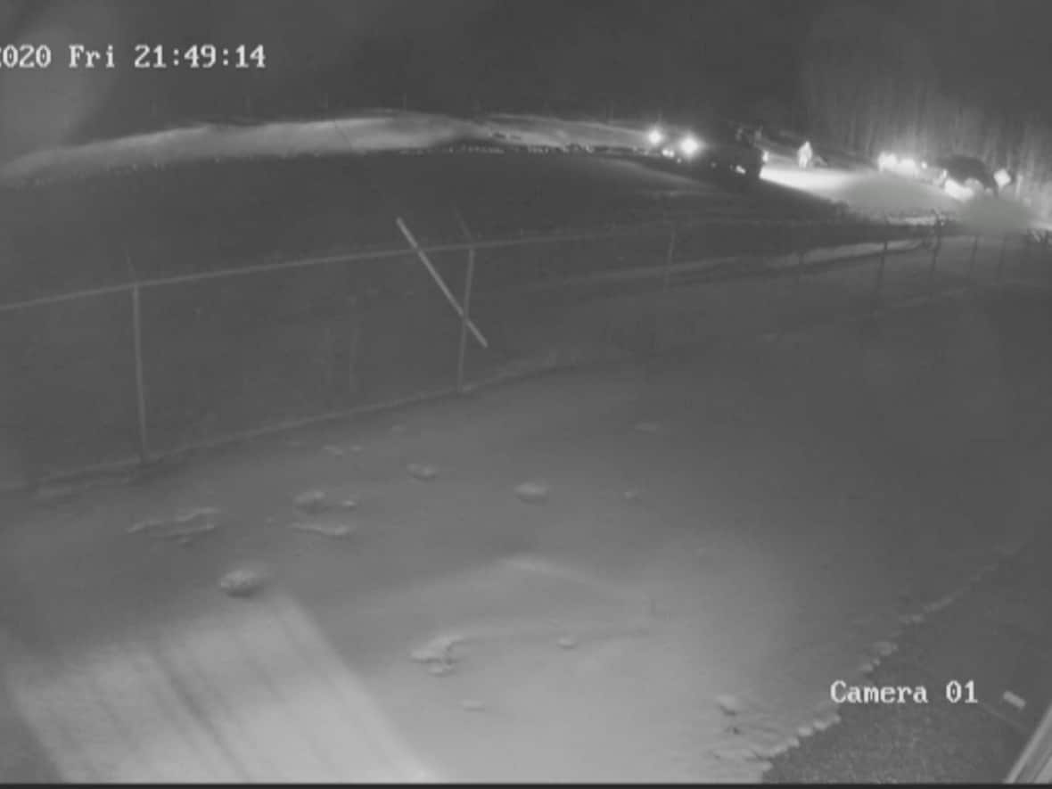 A freeze frame from a surveillance video shown to the jury taken the night Jacob Sansom and Maurice Cardinal were shot to death. (CNRL/Court exhibit - image credit)