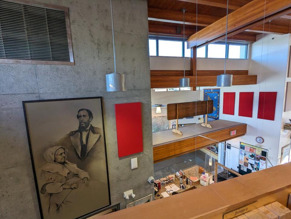 A painting commissioned by Judy Sims of her relatives Howard Estes and Sylvia Stark hangs in the Salt Spring Island library as a reminder of their contributions as early settlers on the island. 