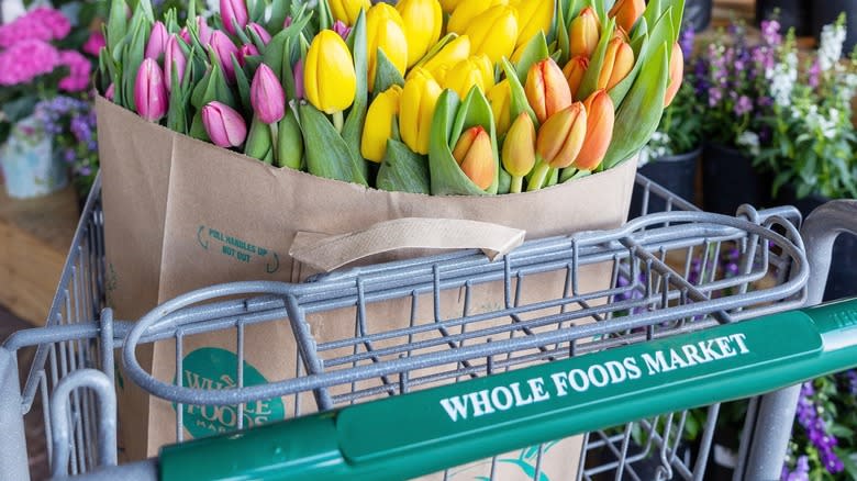 Whole Foods Market cart with flowers