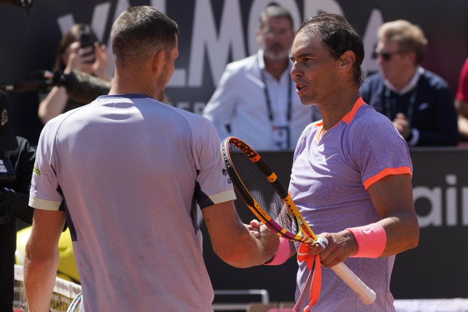 Rafael Nadal, of Spain, right, greets Hubert Hurkacz, of Poland, at the end of their match at the Italian Open tennis tournament in Rome, Saturday, May 11, 2024.(AP Photo/Gregorio Borgia)