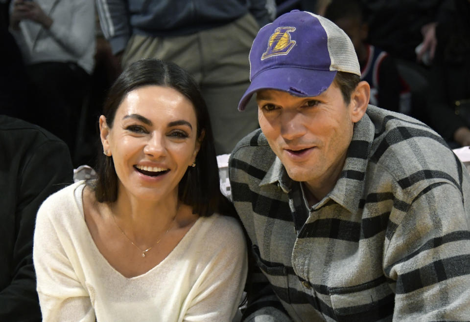LOS ANGELES, CA - NOVEMBER 13: Mila Kunis and Ashton Kutcher attend a basketball between the Los Angeles Lakers and the Brooklyn Nets at Crypto.com Arena on November 13, 2022 in Los Angeles, California. NOTE TO USER: User expressly acknowledges and agrees that, by downloading and or using this photograph, User is consenting to the terms and conditions of the Getty Images License Agreement. (Photo by Kevork Djansezian/Getty Images)