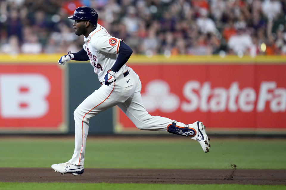 Houston Astros designated hitter Yordan Alvarez runs to second after hitting a double against the Arizona Diamondbacks during the first inning of a baseball game, Saturday, Sept. 7, 2024, in Houston. (AP Photo/Eric Christian Smith)